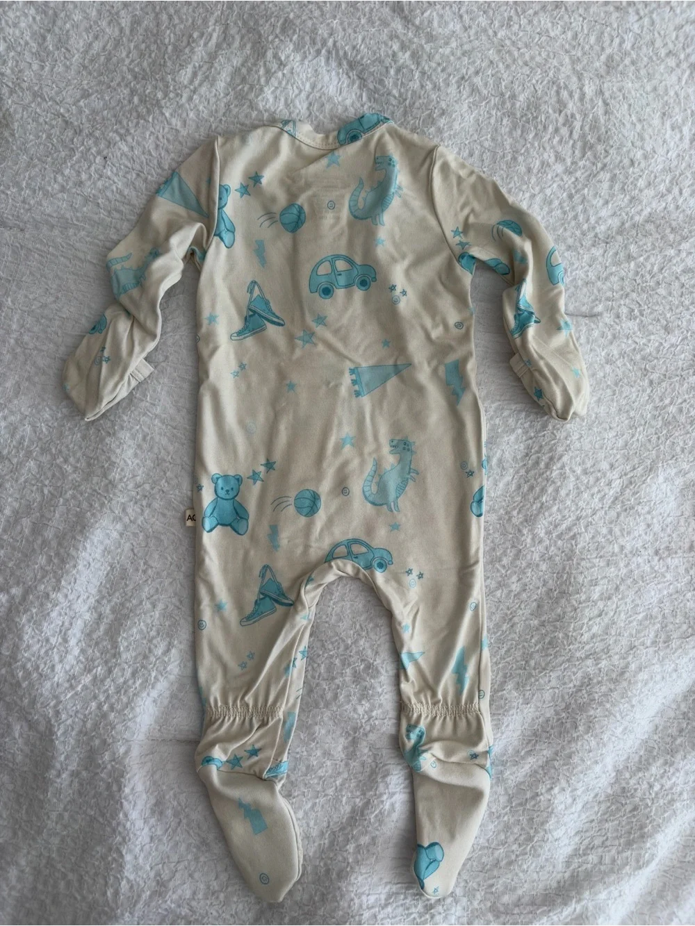 Cream Footed One-Piece with Light Blue Toy & Vehicle Motif